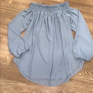 Fantastic Fawn baby blue off the shoulder blouse
